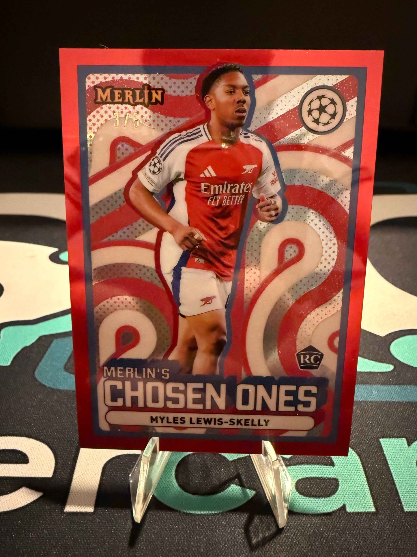 2024/2025 Topps Merlin UCC Myles Lewis-Skelly RC Merlin‘s Chosen Ones Red Parallel /5