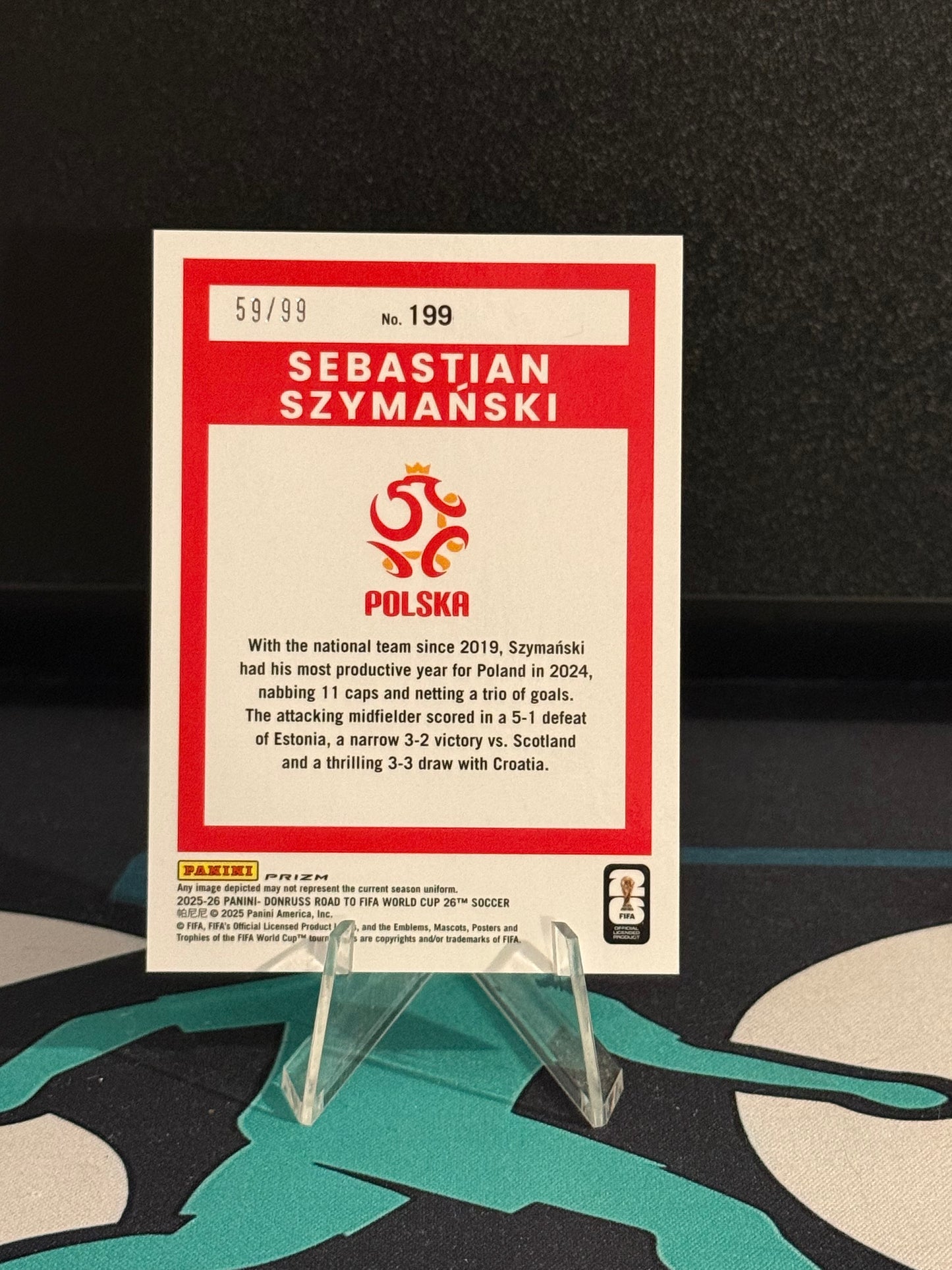 2025/2026 Panini Donruss Road to FIFA World Cup Sebastian Szymanski Orange Parallel /99